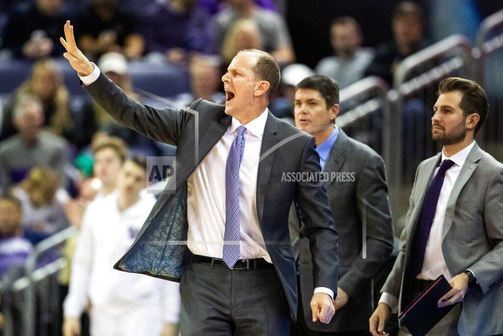 Andy Bao Washington head coach Mike Hopkins gives instructions to his team during the first half of an NCAA college basketball game against Seattle, Tuesday, Dec. 17, 2019, in Seattle. (Andy Bao/The Seattle Times via AP)