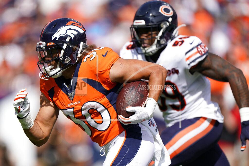 Jack Dempsey Denver Broncos running back Phillip Lindsay (30) runs as Chicago Bears inside linebacker Danny Trevathan (59) pursues during the first half of an NFL football game, Sunday, Sept. 15, 2019, in Denver. (AP Photo/Jack Dempsey)