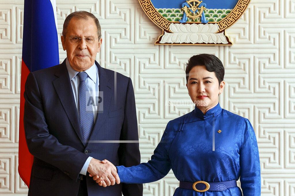 Uncredited In this photo released by Russian Foreign Ministry Press Service, Mongolian Foreign Minister Batmunkh Battsetseg shakes hands with Russian Foreign Minister Sergey Lavrov prior to their talks in Ulaanbaatar, Mongolia, Tuesday, July 5, 2022. (Russian Foreign Ministry Press Service via AP)