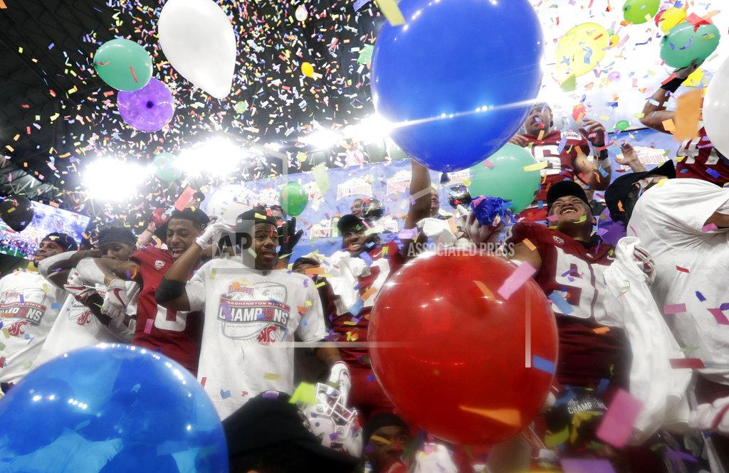 Eric Gay Washington State players celebrate their 28-26 win over Iowa State in the Alamo Bowl NCAA college football game Friday, Dec. 28, 2018, in San Antonio. (AP Photo/Eric Gay)