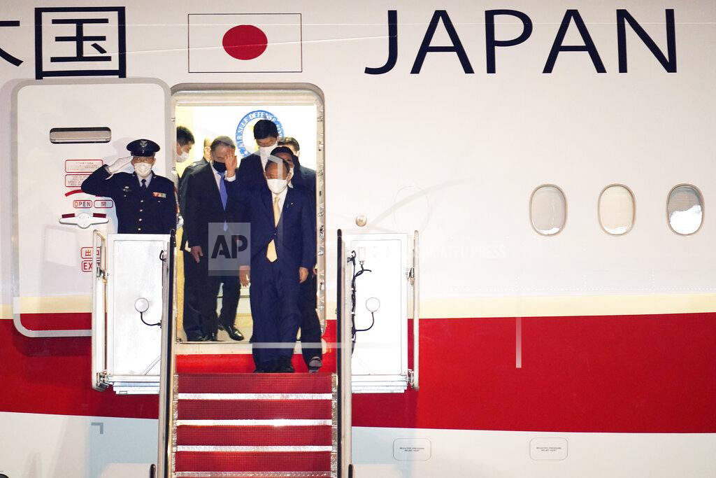 Manuel Balce Ceneta Japanese Prime Minister Yoshihide Suga arrives at Andrews Air Force Base, Md., Thursday, April 15, 2021. Suga will be the first foreign leader to have a face-to-face meeting with President Joe Biden, when they meet at the White House on Friday. (AP Photo/Manuel Balce Ceneta)