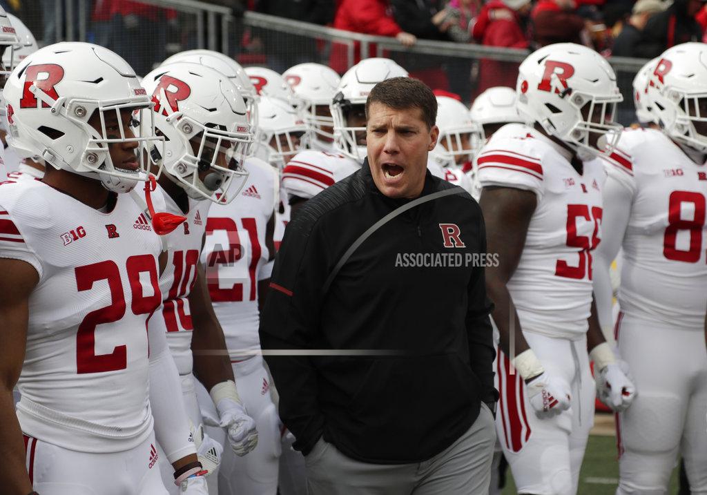 Morry Gash FILE - In this Nov. 3, 2018, file photo, Rutgers coach Chris Ash leads his team onto the field for anNCAA college football game against Wisconsin in Madison, Wis. Rutgers is wrapping up its fourth straight losing season and needs a victory against Michigan State to avoid its first 11-loss season since 2002. “We’re worried about continuing to improve,” Ash said. (AP Photo/Morry Gash, File)