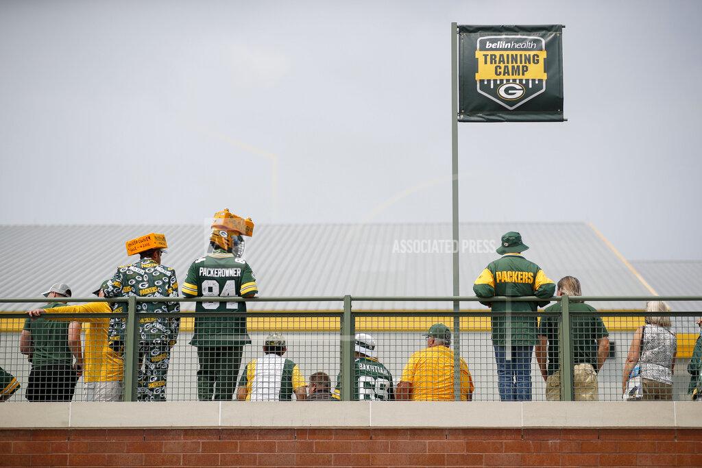 Matt Ludtke Green Bay Packers fans watch practice during NFL football training camp Saturday, July 31, 2021, in Green Bay, Wis. (AP Photo/Matt Ludtke)