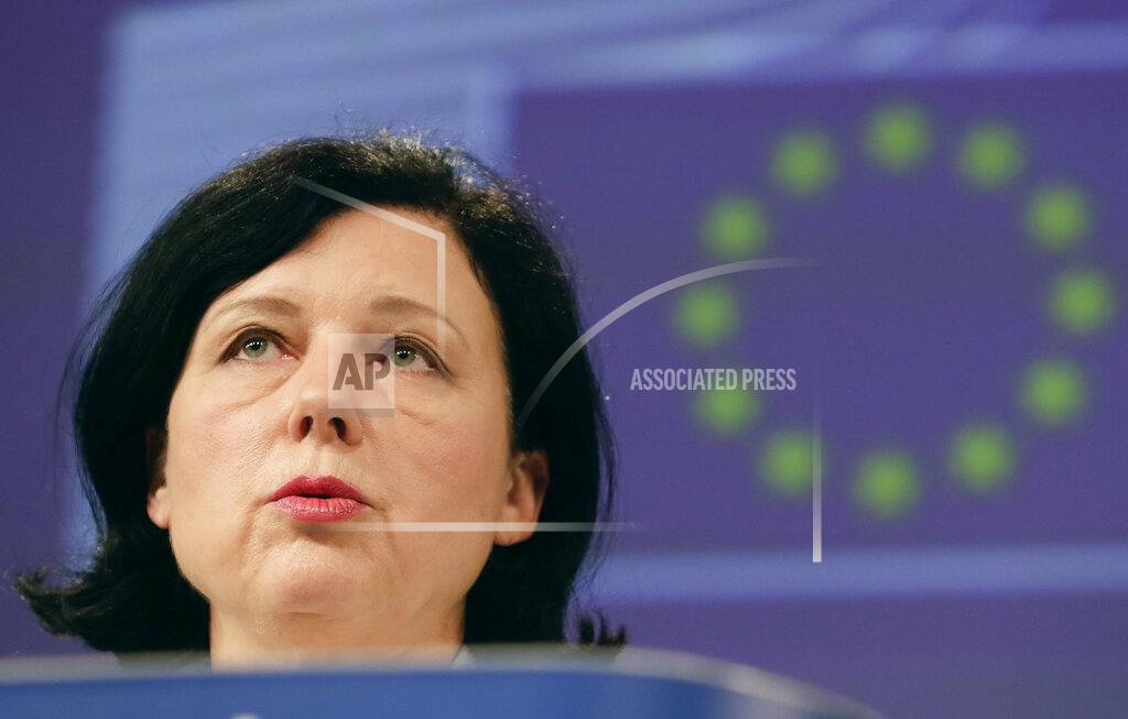 Stephanie Lecocq FILE - In this July 16, 2020, file photo, European Commissioner for Values and Transparency Vera Jourova speaks during a media conference on data protection at EU headquarters in Brussels. The European Union still hasn't completely sorted out its messy post-divorce relationship with Britain — but it has already been plunged into another major crisis. This time the 27-member union is being tested as Poland and Hungary block passage of its budget for the next seven years and an ambitious package aimed at rescuing economies ravaged by the coronavirus pandemic. (Stephanie Lecocq/Pool Photo via AP, File)