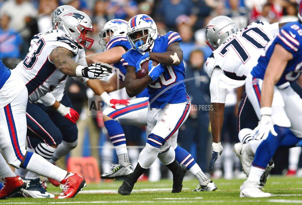 Adrian Kraus Buffalo Bills running back Frank Gore, center, carries the ball against the New England Patriots in the second half of an NFL football game, Sunday, Sept. 29, 2019, in Orchard Park, N.Y. (AP Photo/Adrian Kraus)