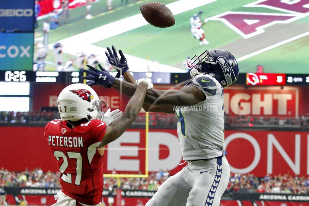 Ross D. Franklin Arizona Cardinals cornerback Kevin Peterson (27) breaks up a pass intended for Seattle Seahawks wide receiver D.K. Metcalf during the first half of an NFL football game, Sunday, Sept. 29, 2019, in Glendale, Ariz. (AP Photo/Ross D. Franklin)