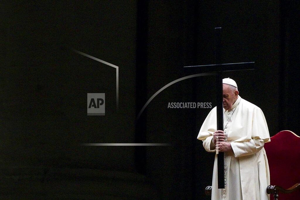 Angelo Carconi Pope Francis leads the Via Crucis (Way of the Cross) procession in the empty square outside the Saint Peter's Basilica during Good Friday celebrations at the Vatican, with no public participation due to the Coronavirus pandemic, Friday, April 2, 2021. (Angelo Carconi/Pool photo via AP)