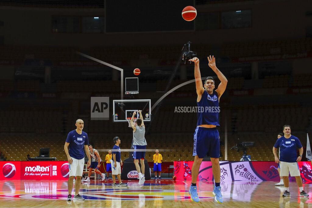 Andy Wong Members of the Argentina basketball team shoot free throws during practice at the Wuhan Sport Center ahead of the FIBA Basketball World Cup, in Wuhan in central China's Hubei province, Friday, Aug. 30, 2019. The competition, which features 32 teams from around the globe, will be held in 8 cities across China starting on Saturday. (AP Photo/Andy Wong)