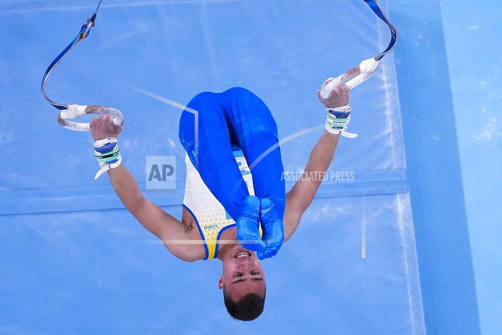 Morry Gash Milad Karimi, of Kazakhstan, performs on the rings during men's artistic gymnastic qualifications at the 2020 Summer Olympics, Saturday, July 24, 2021, in Tokyo. (AP Photo/Morry Gash)