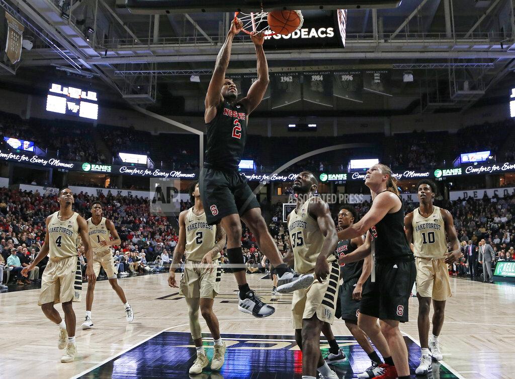 Chuck Burton North Carolina State's Torin Dorn (2) dunks against Wake Forest during the first half of an NCAA college basketball game in Winston-Salem, N.C., Tuesday, Jan. 15, 2019. (AP Photo/Chuck Burton)
