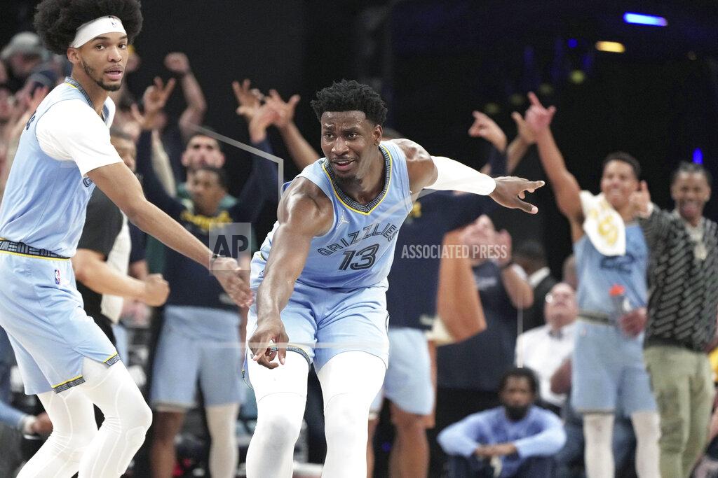 Karen Pulfer Focht Memphis Grizzlies' Jaren Jackson Jr. (13) reacts after he makes a basket in the second half of Game 5 of an NBA basketball second-round playoff series against the Golden State Warriors Wednesday, May 11, 2022, in Memphis, Tenn. (AP Photo/Karen Pulfer Focht)