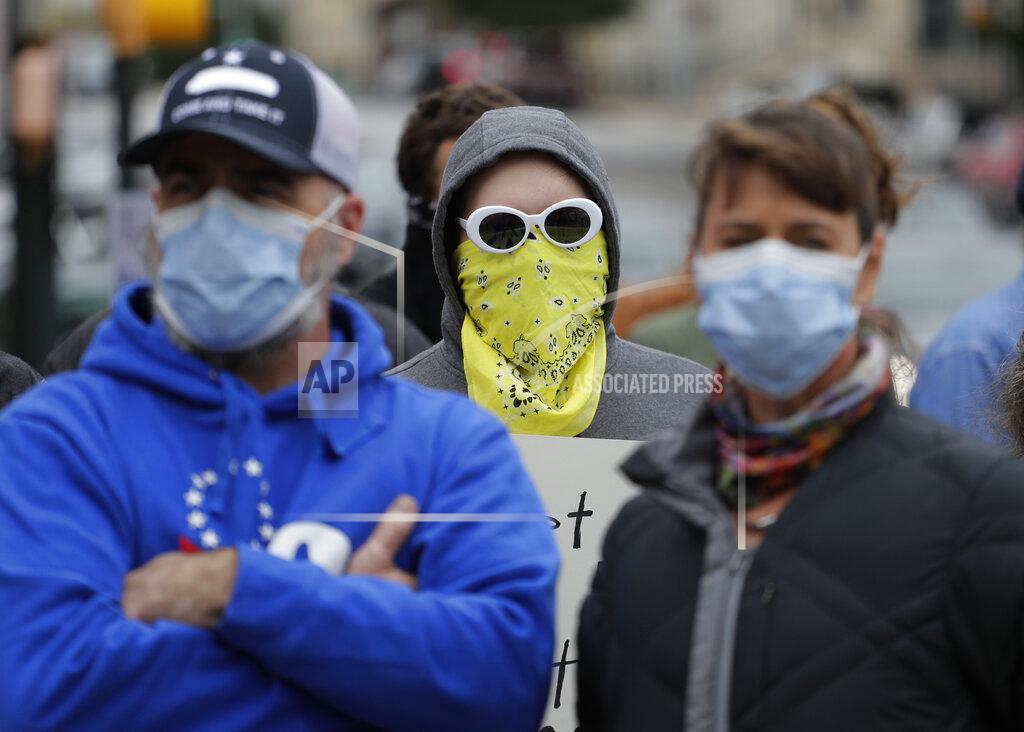 Eric Gay Protesters rally at the Texas State Capitol to speak out against Texas' handling of the COVID-19 outbreak, in Austin, Texas, Saturday, April 18, 2020. Austin and many other Texas cities remain under stay-at-home orders due to the COVID-19 outbreak except for essential personal. (AP Photo/Eric Gay)