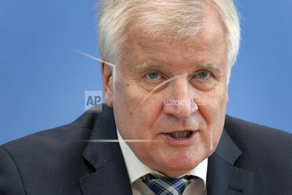 Michael Sohn German Interior Minister Horst Seehofer addresses the media during a press conference on the 'Constitution Protection Report 2020' in Berlin, Germany, Tuesday, June 15, 2021. (AP Photo/Michael Sohn, pool)