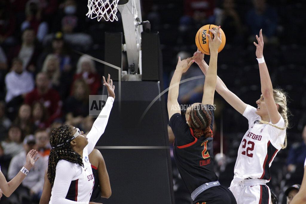 Young Kwak Stanford forward Cameron Brink (22) blocks a shot by Maryland forward Mimi Collins (2) during the first half of a college basketball game in the Sweet 16 round of the NCAA tournament, Friday, March 25, 2022, in Spokane, Wash. (AP Photo/Young Kwak)