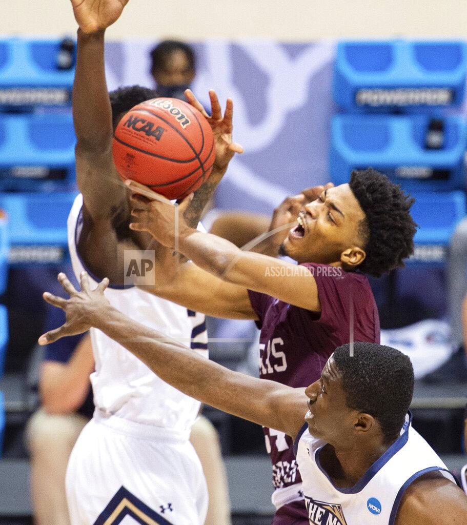 Doug Mcschooler Texas Southern forward John Walker III (24) is fouled as he takes a shot during the first half of a First Four game against Mount St. Mary's in the NCAA men's college basketball tournament, Thursday, March 18, 2021, in Bloomington, Ind. (AP Photo/Doug McSchooler)