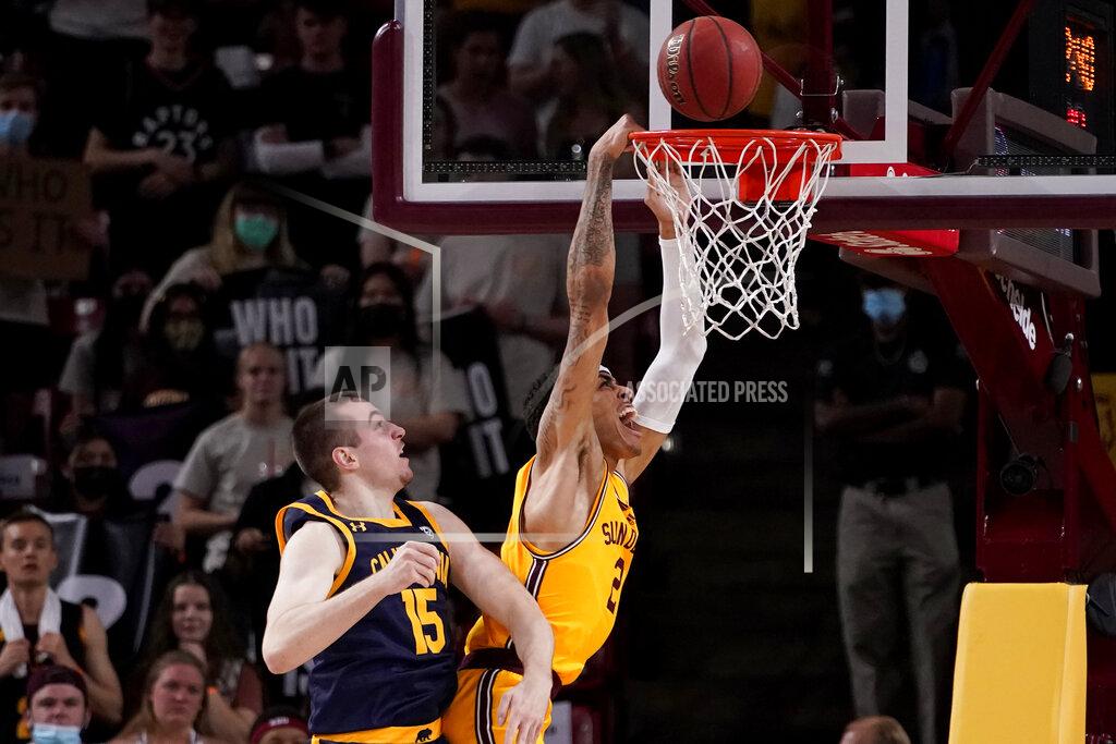 Matt York California forward Grant Anticevich (15) fouls Arizona State forward Jalen Graham (2) during the first half of an NCAA college basketball game, Thursday, March 3, 2022, in Tempe, Ariz. (AP Photo/Matt York)