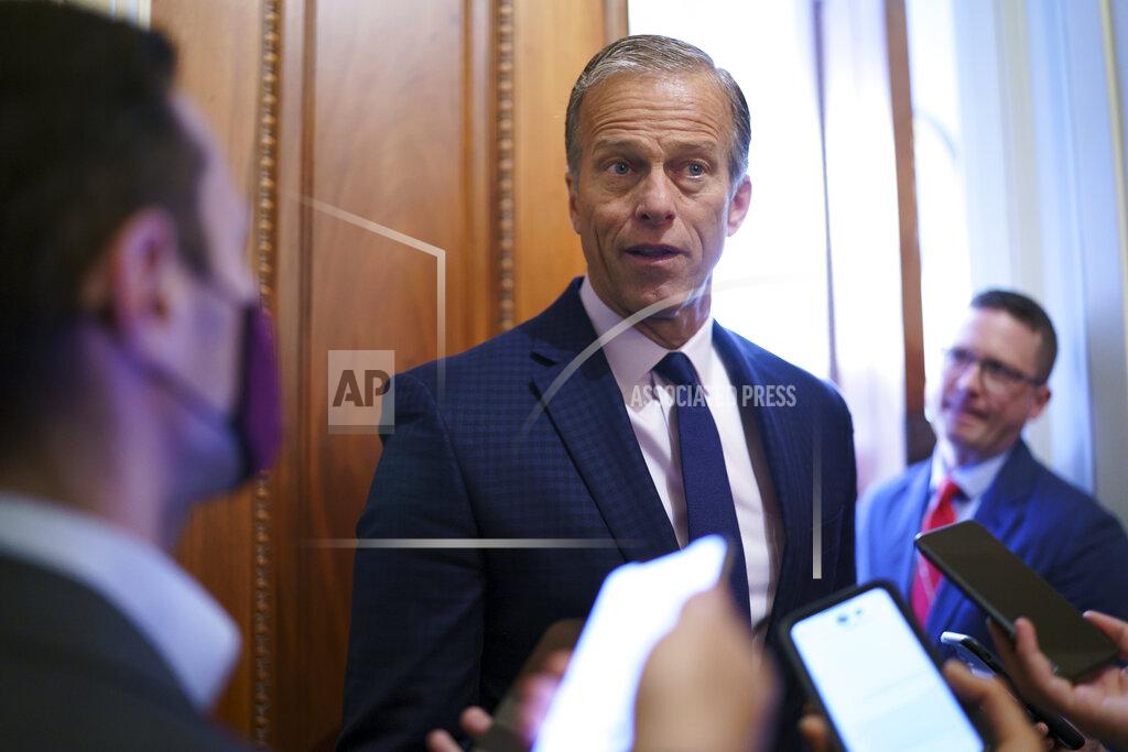 J. Scott Applewhite Senate Minority Whip John Thune, R-S.D., talks to reporters outside his office as the Senate works to advance the $1 trillion bipartisan infrastructure bill, at the Capitol in Washington, Monday, Aug. 2, 2021. The 2,700-page bill includes new expenditures on roads, bridges, water pipes broadband and other projects, plus cyber security. (AP Photo/J. Scott Applewhite)
