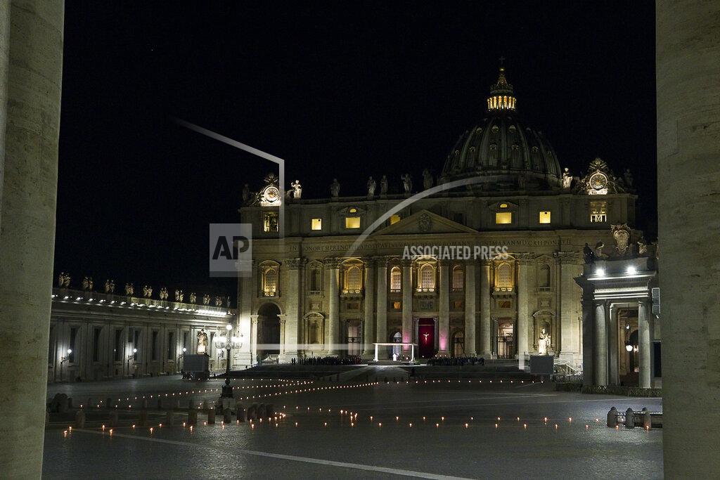 Angelo Carconi Pope Francis leads the Via Crucis (Way of the Cross) procession in the empty square outside the Saint Peter's Basilica during Good Friday celebrations at the Vatican, with no public participation due to the Coronavirus pandemic, Friday, April 2, 2021. (Angelo Carconi/Pool photo via AP)