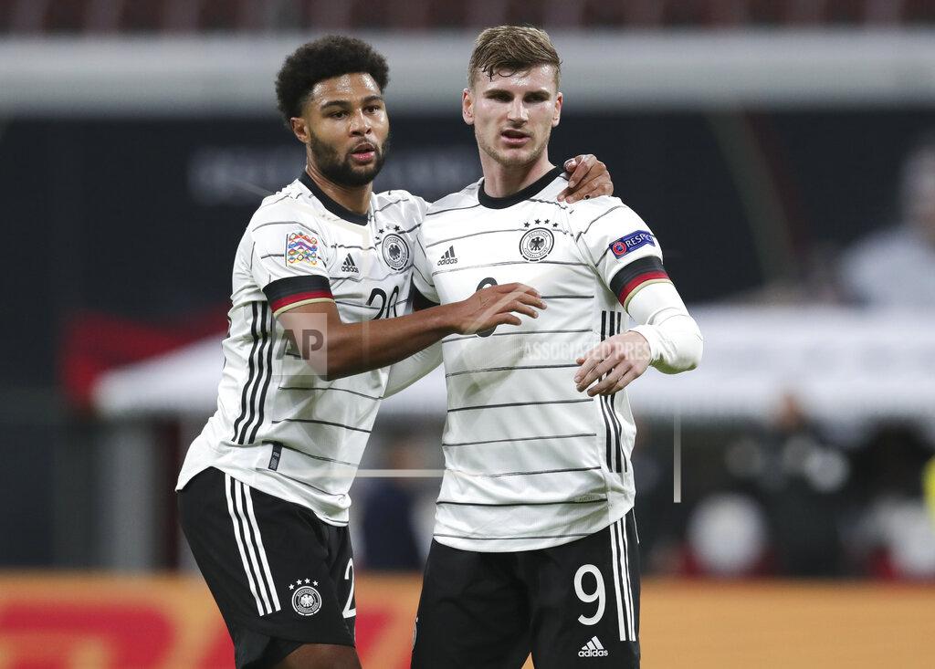 Michael Sohn Germany's Timo Werner, right, celebrates with teammate Serge Gnabry after scoring his team's third goal during the UEFA Nations League soccer match between Germany and the Ukraine at the Red Bull Arena in Leipzig, Germany, Saturday, Nov. 14, 2020. (AP Photo/Michael Sohn)