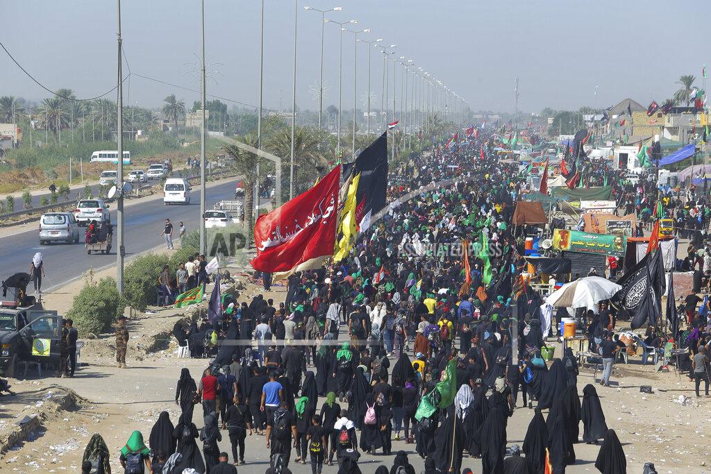 Anmar Khalil Shiite pilgrims arrive Karbala, Iraq, for the Arbaeen ritual Tuesday, Oct. 6, 2020. Arbaeen holiday marks the end of the forty day mourning period after the anniversary of the martyrdom of Imam Hussein, the Prophet Muhammad's grandson in the 7th century. (AP Photo/Anmar Khalil)(AP Photo/Anmar Khalil)