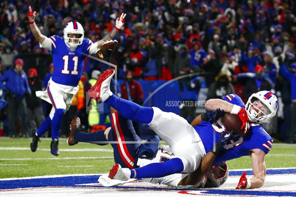 FILE - Buffalo Bills tight end Dawson Knox (88) makes a catch for a touchdown during the first half of an NFL wild-card playoff football game against the New England Patriots in Orchard Park, N.Y., Saturday, Jan. 15, 2022. The Bills signed tight end Dawson Knox to a four-year contract extension in a move made on Wednesday, Sept. 7, 2022, that locks up one of the team's top scoring threats.(AP Photo/ Jeffrey T. Barnes, File)