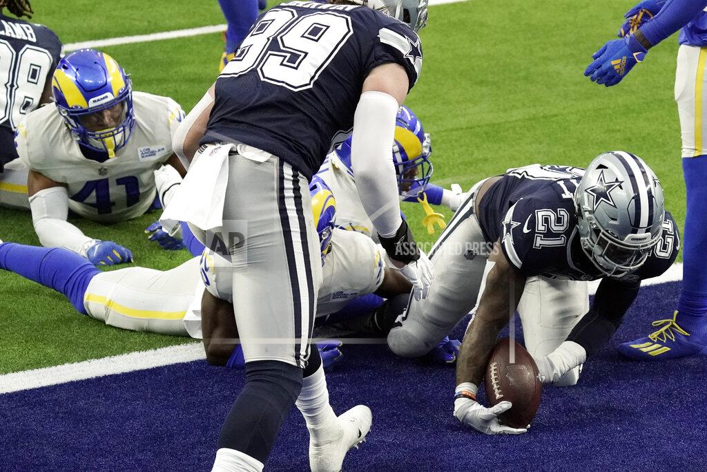 Jae C. Hong Dallas Cowboys running back Ezekiel Elliott runs into the end zone for a touchdown during the first half of an NFL football game against the Los Angeles Rams Sunday, Sept. 13, 2020, in Inglewood, Calif. (AP Photo/Jae C. Hong )