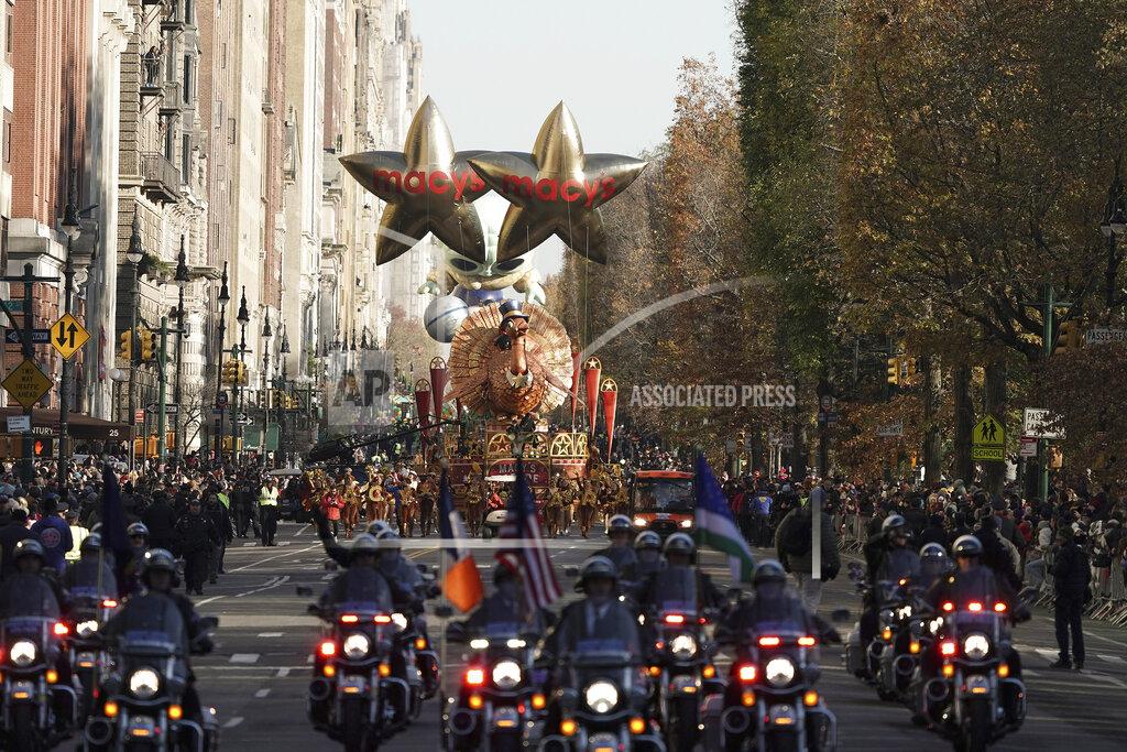 Jeenah Moon The Tom Turkey float leads the way down Central Park West during the Macy's Thanksgiving Day Parade, Thursday, Nov. 24, 2022, in New York. (AP Photo/Jeenah Moon)