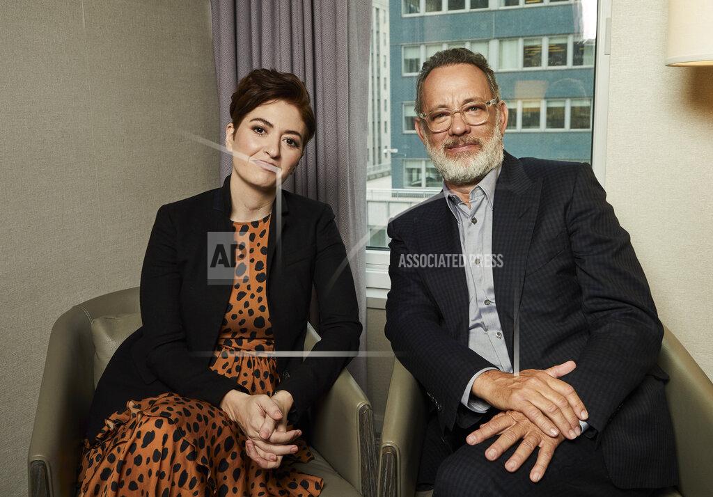 This Nov. 17, 2019 photo shows Marielle Heller, left, and Tom Hanks pose for a portrait in New York to promote their film,