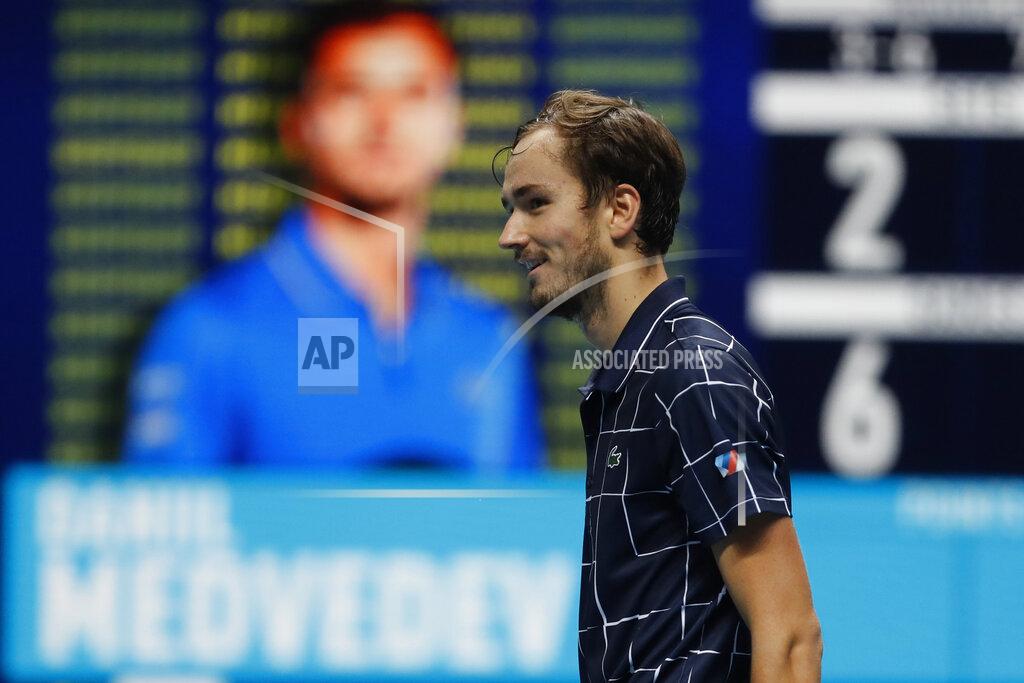 Frank Augstein Daniil Medvedev of Russia smiles after winning against Rafael Nadal of Spain in their semifinal match at the ATP World Finals tennis tournament at the O2 arena in London, Saturday, Nov. 21, 2020. (AP Photo/Frank Augstein)