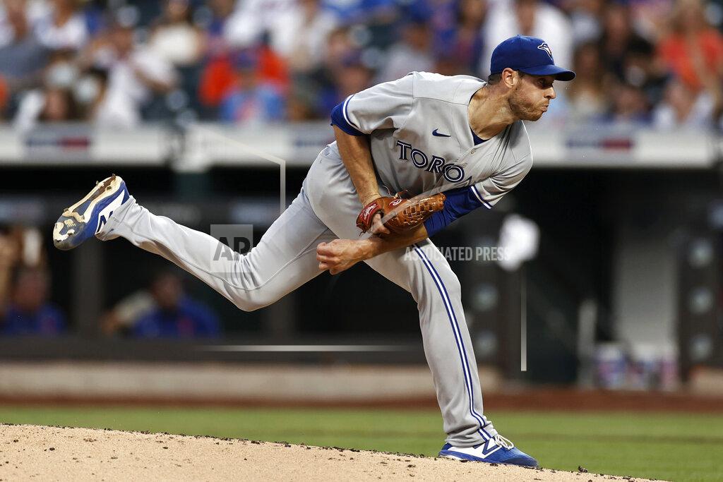 Adam Hunger Toronto Blue Jays pitcher Steven Matz watches a throw to a New York Mets batter during the third inning of a baseball game Friday, July 23, 2021, in New York. (AP Photo/Adam Hunger)