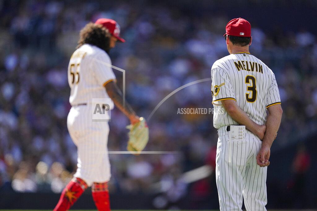 Gregory Bull San Diego Padres manager Bob Melvin (3) watches starting pitcher Sean Manaea throw a few pitches after being hit on a comebacker from Seattle Mariners' Carlos Santana during the third inning from of a baseball game Monday, July 4, 2022, in San Diego. (AP Photo/Gregory Bull)