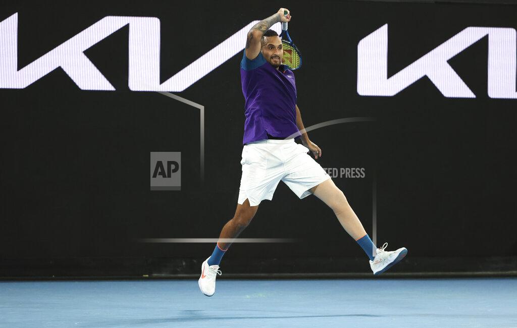 Hamish Blair Australia's Nick Kyrgios plays a shot during his third round match against Austria's Dominic Thiem at the Australian Open tennis championship in Melbourne, Australia, Friday, Feb. 12, 2021.(AP Photo/Hamish Blair)