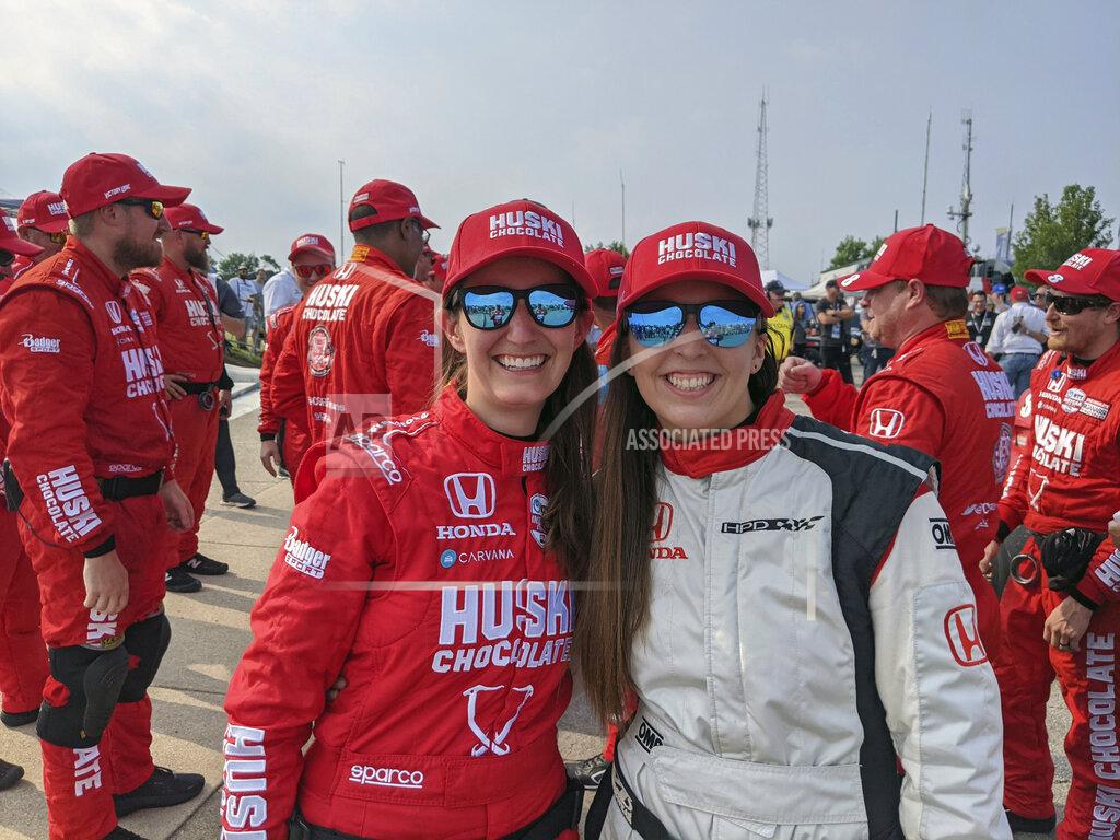 Uncredited In this photo provided by Chip Ganassi Racing, Chip Ganassi engineer Angela Ashmore, left, and Nicole Rotondo, an engineer with Honda Performance Development, pose after Marcus Ericsson, of Sweden, won the first race of the IndyCar Detroit Grand Prix auto racing doubleheader on Belle Isle in Detroit, Saturday, June 12, 2021. The last three IndyCar races have been won by drivers who have female engineers on their teams, a trend that could continue Sunday at Mid-Ohio Sports Car Course. (Chip Ganassi Racing via AP)