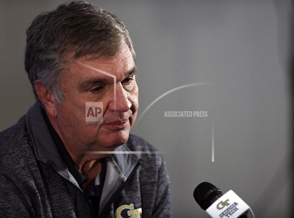 Paul Johnson pauses during a press conference about his retirement, Thursday, Nov. 29, 2018, in Atlanta. Johnson, the longest-serving Georgia Tech NCAA college football coach in a half-century, announced his retirement Wednesday after 11 seasons with the team. (AP Photo/Annie Rice)