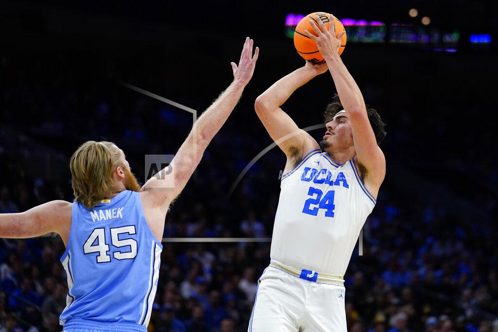 Matt Rourke UCLA's Jaime Jaquez Jr. (24) goes up for a shot against North Carolina's Brady Manek (45) during the first half of a college basketball game in the Sweet 16 round of the NCAA tournament, Friday, March 25, 2022, in Philadelphia. (AP Photo/Matt Rourke)