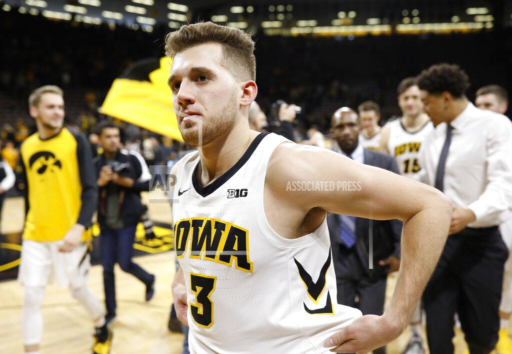 Matthew Putney Iowa's Jordan Bohannon walks off the court after Iowa won 72-62 and Bohannon scored his 1,000th career point in an NCAA college basketball game against Ohio State, Saturday, Jan. 12, 2019, in Iowa City, Iowa. (AP Photo/Matthew Putney)