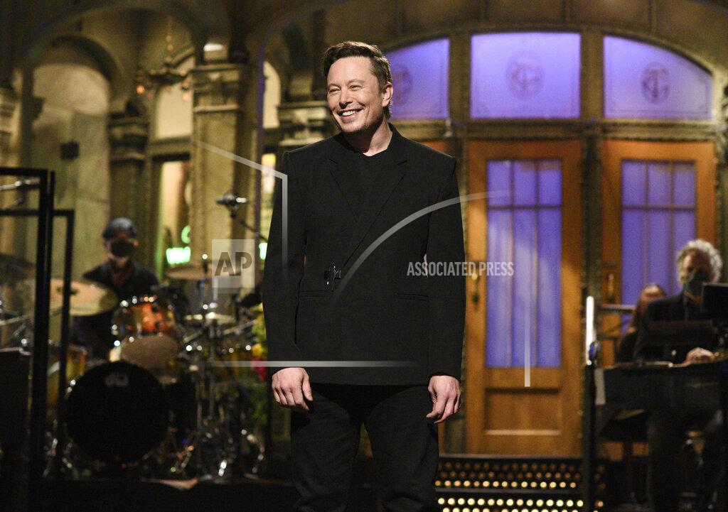 Will Heath This image released by NBC shows host Elon Musk delivering his opening monologue on "Saturday Night Live" in New York on May 8, 2021. (Will Heath/NBC via AP)