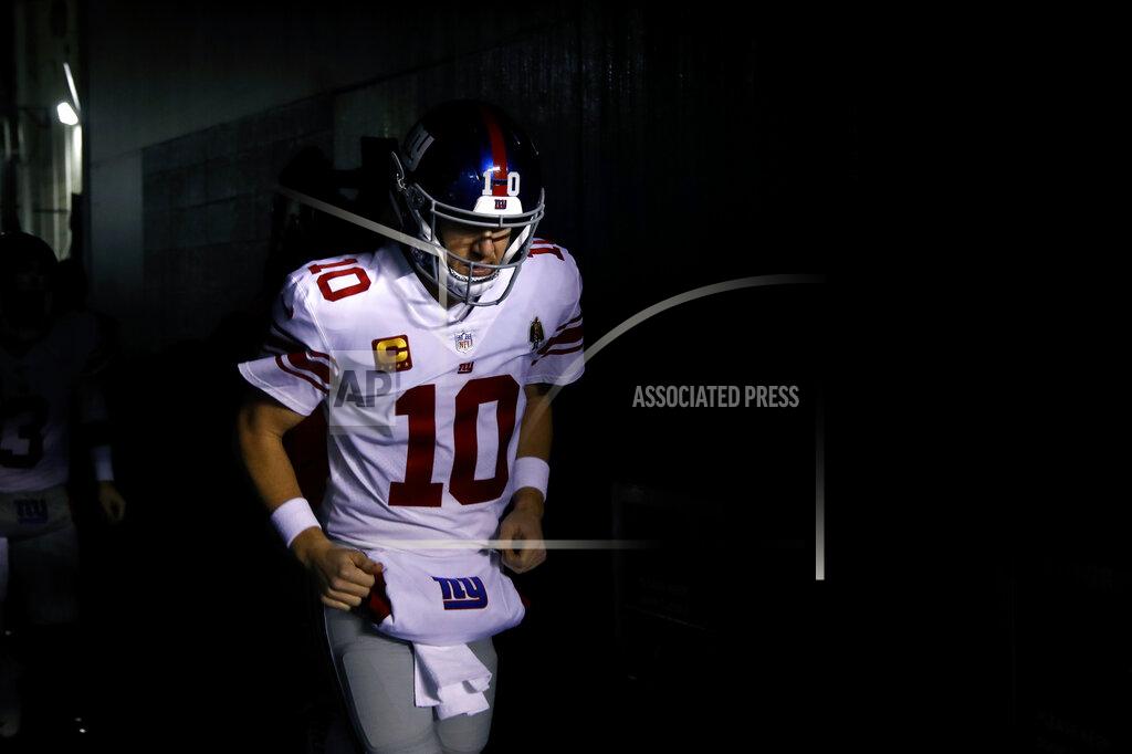Matt Rourke New York Giants' Eli Manning runs onto the field before an NFL football game against the Philadelphia Eagles, Monday, Dec. 9, 2019, in Philadelphia. (AP Photo/Matt Rourke)