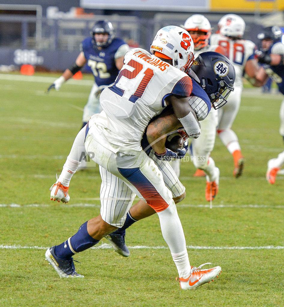 Howard Simmons Notre Dame wide receiver Chase Claypool (83) scores a touchdown against Syracuse defensive back Trill Williams (21) during an NCAA college football game, Saturday, Nov. 17, 2018, at Yankee Stadium in New York. (AP Photo/Howard Simmons)