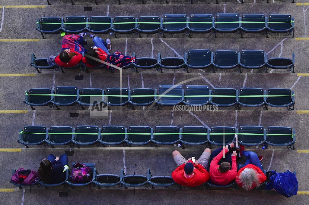 David Dermer Guests and family members of the traveling party sit in the stands before the start of Game 1 of an American League wild-card baseball series between the New York Yankees and Cleveland Indians, Tuesday, Sept. 29, 2020, in Cleveland. (AP Photo/David Dermer)