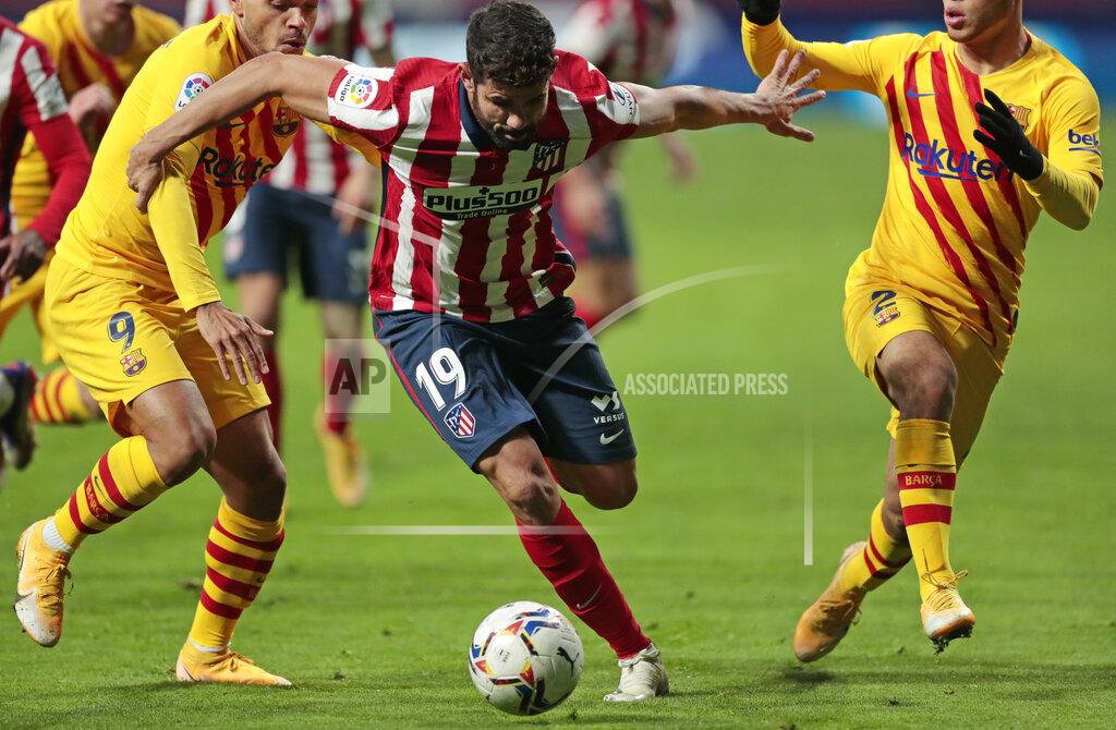 Bernat Armangue Atletico Madrid's Diego Costa in action during the Spanish La Liga soccer match between Atletico Madrid and FC Barcelona at the Wanda Metropolitano stadium in Madrid, Spain, Saturday, Nov. 21, 2020. (AP Photo/Bernat Armangue)
