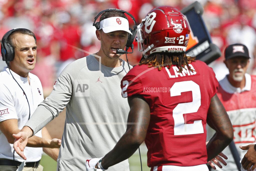 Sue Ogrocki Oklahoma head coach Lincoln Riley greets wide receiver CeeDee Lamb (2) following a touchdown in the second quarter of an NCAA college football game against Texas Tech in Norman, Okla., Saturday, Sept. 28, 2019. (AP Photo/Sue Ogrocki)