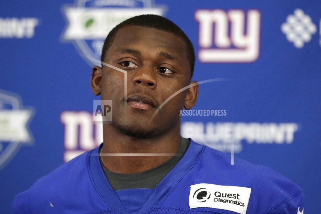 Julio Cortez FILE - New York Giants rookie Deandre Baker talks to reporters during NFL football rookie camp, Friday, May 3, 2019, in East Rutherford, N.J. The Giants have waived cornerback DeAndre Baker with the 22-year-old facing armed robbery charges relating to an incident in Florida in May. The Giants announced the move on Tuesday, Sept. 8, 2020, less than a week after co-owner John Mara said the team was close to a decision on Baker's future with the club.(AP Photo/Julio Cortez, File)