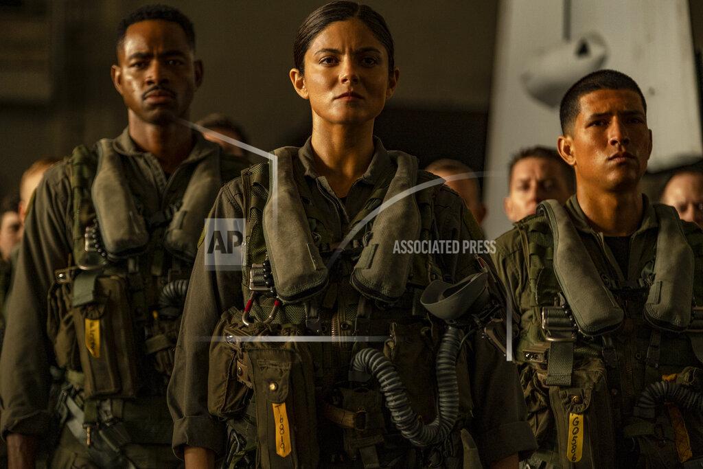 Scott Garfield This image released by Paramount Pictures shows, from left, Jay Ellis, Monica Barbaro and Danny Ramirez in "Top Gun: Maverick." (Paramount Pictures via AP)
