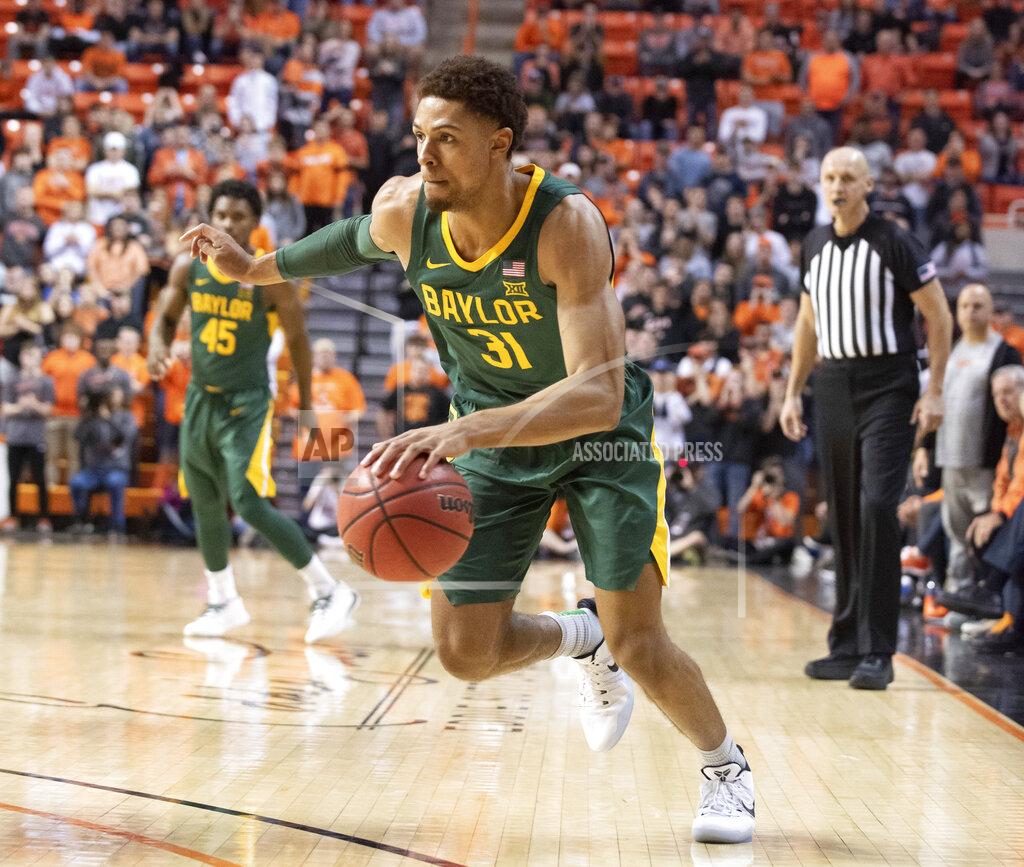 Brody Schmidt Baylor guard MaCio Teague (31) drives the ball during the second half of an NCAA college basketball game against Oklahoma State in Stillwater, Okla., Saturday, Jan. 18, 2020. (AP Photo/Brody Schmidt)