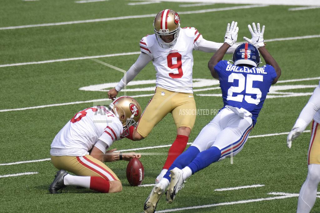 Bill Kostroun San Francisco 49ers' Robbie Gould, center, kicks a field goal while New York Giants' Corey Ballentine tries to defend during the first half of an NFL football game, Sunday, Sept. 27, 2020, in East Rutherford, N.J. (AP Photo/Bill Kostroun)