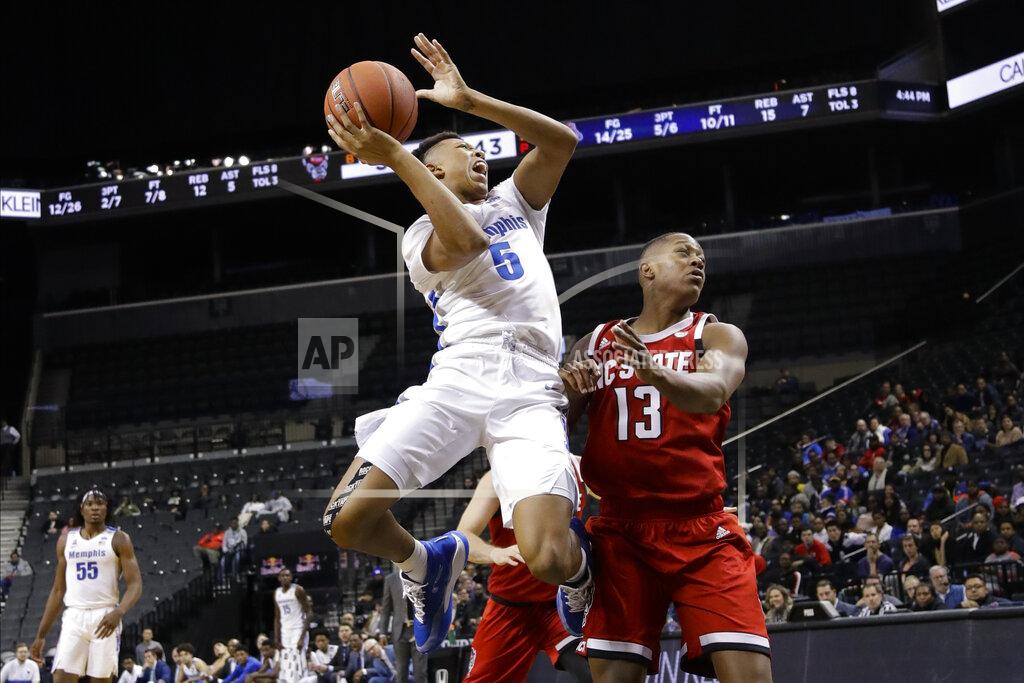 Frank Franklin Ii Memphis' Boogie Ellis (5) shoots over North Carolina State's C.J. Bryce (13) during the first half of an NCAA college basketball game in the Barclays Classic, Thursday, Nov. 28, 2019, in New York. (AP Photo/Frank Franklin II)