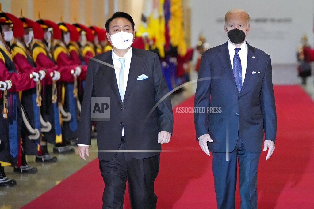 Lee Jin-Man U.S. President Joe Biden, right, and South Korean President Yoon Suk Yeol arrive at the National Museum of Korea for the state dinner, in Seoul, South Korea, Saturday, May 21, 2022. (AP Photo/Lee Jin-man, Pool)