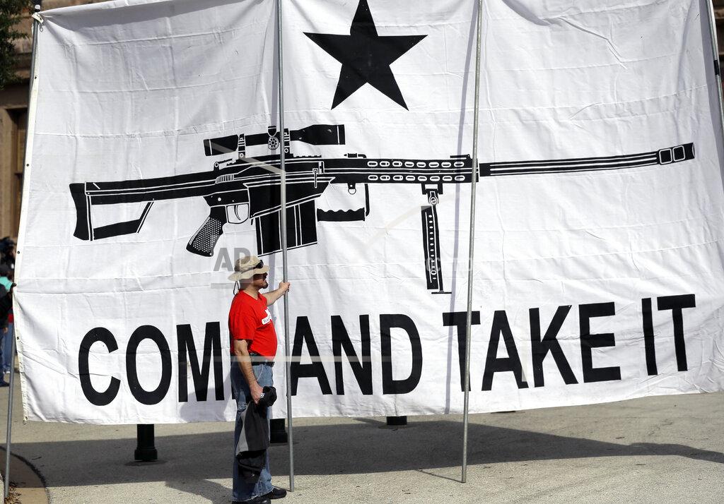 Eric Gay FILE - A demonstrator helps hold a large "Come and Take It" banner at a rally in support of open carry gun laws at the Capitol, on Jan. 26, 2015, in Austin, Texas. A gunman killing multiple elementary school children and adults in Texas on Tuesday, May 24, 2022, adds to the state's grim recent history of mass shootings. (AP Photo/Eric Gay, File)