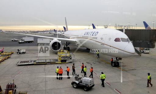 FILE - A Dreamliner 787-10 arriving from Los Angeles pulls up to a gate at Newark Liberty International Airport in Newark, N.J., Monday, Jan. 7, 2019. Federal safety officials are directing operators of some Boeing planes to adopt extra procedures when landing on wet or snowy runways near impending 5G service because, they say, interference from the wireless networks could mean that the planes need more room to land.
The Federal Aviation Administration said Friday, Jan. 14, 2022, that interference could delay systems like thrust reversers on Boeing 787s from kicking in, leaving only the brakes to slow the plane. (AP Photo/Seth Wenig, File)